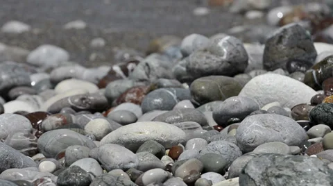 Sea waves roll on pebble beach Stock Footage 39701682
