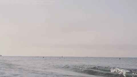 Sea waves roll on a sandy beach Stock Footage 90579550