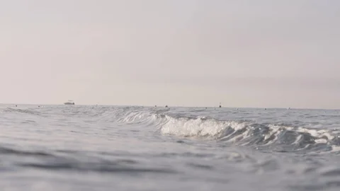 Sea waves roll on a sandy beach Stock Footage 90579712