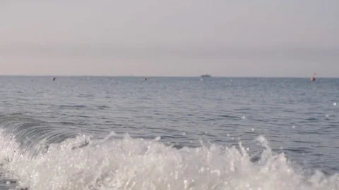 Sea waves roll on a sandy beach Stock Footage 90579927