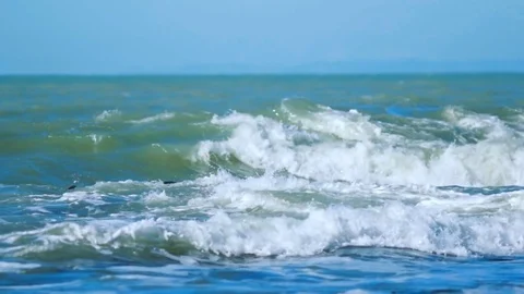 The sea waves roll to the shore Stock Footage 74493113