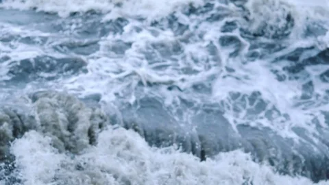 The sea waves roll to the shore Stock Footage 74495140