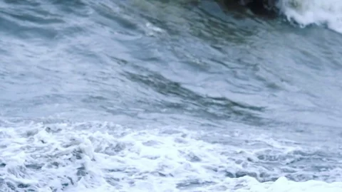 The sea waves roll to the shore Stock Footage 74495416