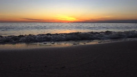 Sea Waves rolling On A Empty Sandy Beach Stock Footage 77542781