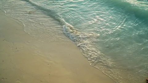 Sea Waves Rolling On Sandy Beach At Sunset Stock Footage 107427250
