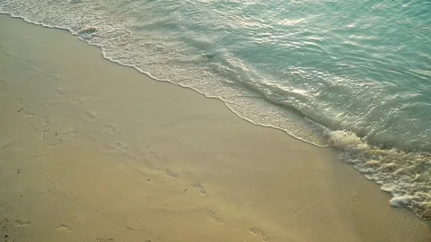 Sea Waves Rolling On Sandy Beach At Sunset Stock Footage 107427573