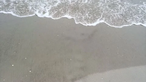 Sea Waves Rolling On A Sandy Beach Stock Footage 138595159