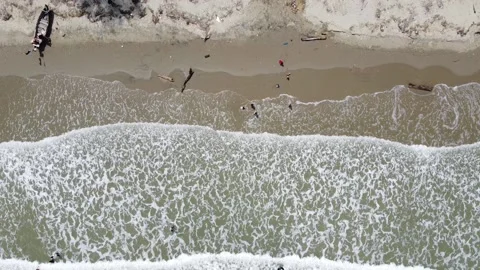 Sea waves rolling on a sandy beach, aerial view. taken by drone Stock Footage 147672766