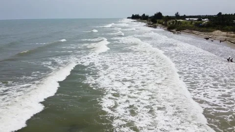 Sea waves rolling on a sandy beach, aerial view. taken by drone Stock Footage 147672907