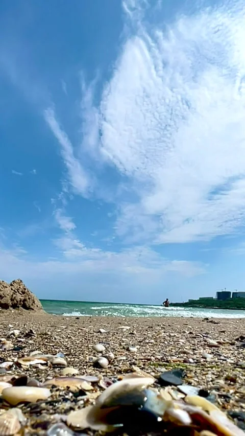 Sea Waves Rolling on Sandy Beach from Below Stock Footage 319341919