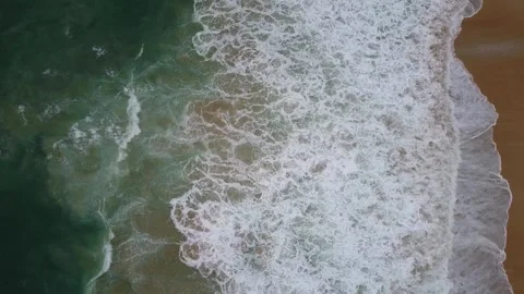 Sea waves run ashore, view from a height Stock Footage 166056301