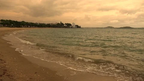 Sea waves run onto the sandy shore Stock Footage 131884089