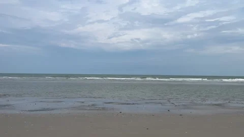 Sea waves on the sand beach. Beautiful sunny day view to summer Stock Footage 304559611