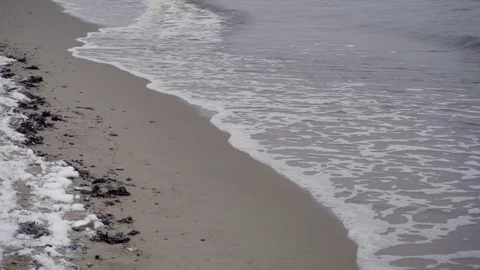 Sea waves on sand beach during winter Stock Footage 73002555