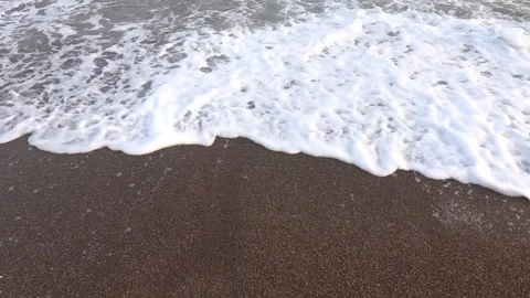 Sea waves on sand beach Stock Footage 142778956