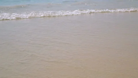 Sea waves on the sand close-up Stock Footage 87418399