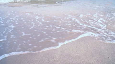 Sea waves on the sand close-up Stock Footage 87418630