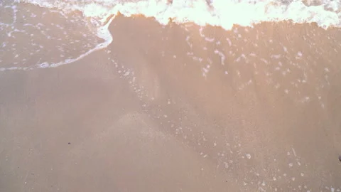 Sea waves on the sand close-up Stock Footage 87418728