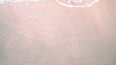 Sea waves on the sand close-up Stock Footage 87418908