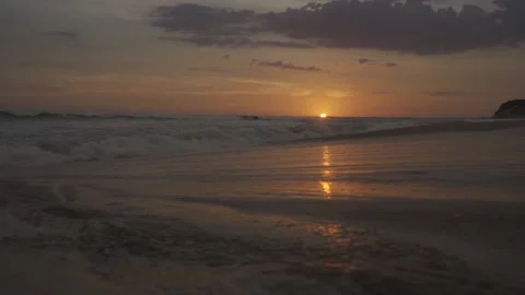 Sea Waves on Sand during nostalgic sunset Video stock 148892166