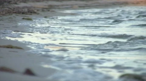 Sea waves on the sand with the sunset 스톡 동영상 47993792