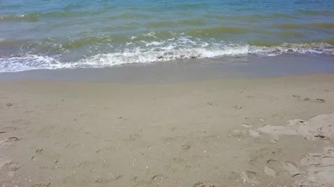 Sea waves on sandy beach foreshore Stock Footage 193733751