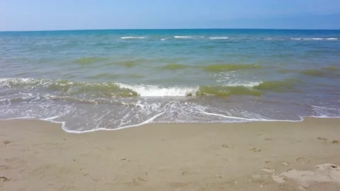 Sea waves on sandy beach foreshore Stock Footage 193733940
