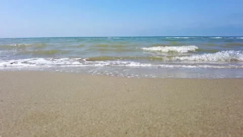 Sea waves on sandy beach foreshore Stock Footage 193735597