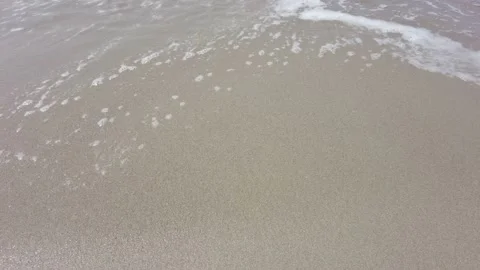 Sea waves on sandy beach foreshore Stock Footage 193738129