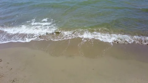 Sea waves on sandy beach foreshore Stock Footage 193744167