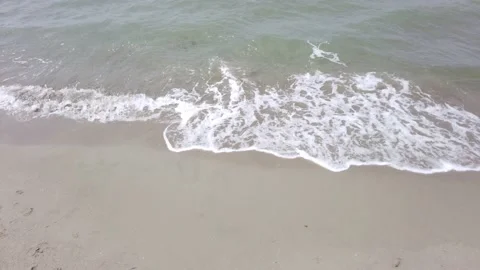 Sea waves on sandy beach foreshore Stock Footage 193744748