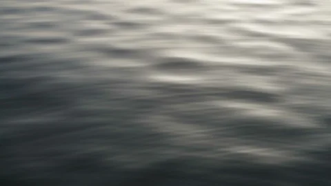 Sea waves in slow motion during golden hour Stock Footage 102387300