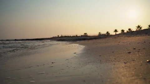 Sea waves slow motion during the beautiful sunset in hot island. Stock Footage 128842072