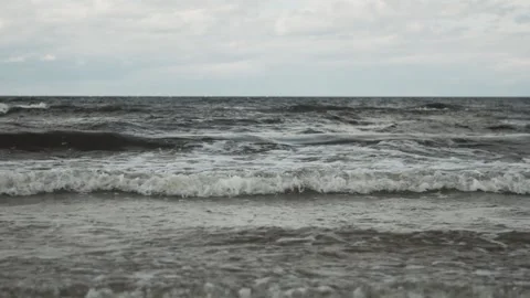 Sea waves in slow motion on a moody cloudy day. Stock Footage 142476757
