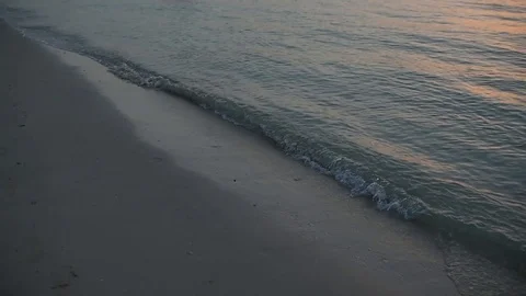 Sea waves in slow motion on a sunset Video stock 87602771