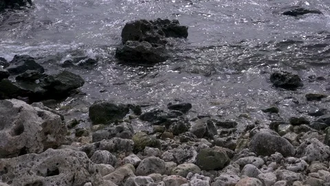 Sea waves splash over stony coast Stock-Footage 88259083