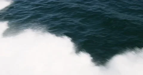 Sea waves splash from sailing boat. Stock Footage 158939894
