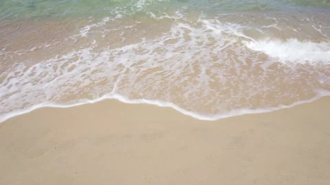 Sea waves splashing on a sand Stock Footage 150807129
