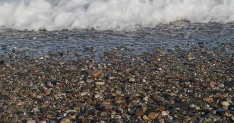 Sea waves on the stone shore Stock Footage 135583435
