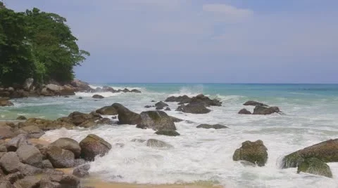 Sea waves strike the stones on the beach during a storm Stock Footage 63469974