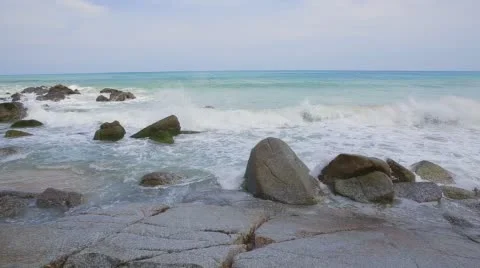 Sea waves strike the stones on the beach during a storm Stock-Footage 63471365