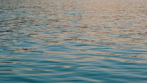 Sea waves at sunset. 4k Stock Footage 125443840