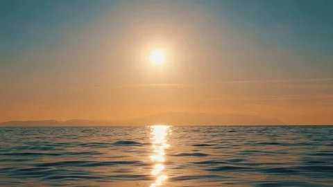 Sea waves at sunset. 4k Stock Footage 125485568