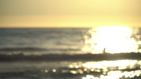 Sea Waves - Sunset Bokeh Stock Footage 77674586