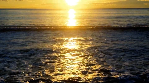 Sea waves with sunset light in a summer day. Stock Footage 98285687