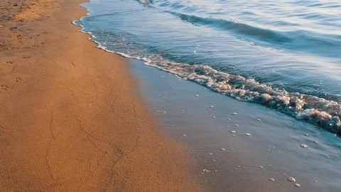 Sea waves at sunset.4k. slowmotion Stock Footage 125195171
