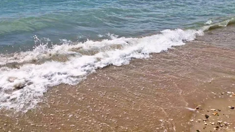 Sea Waves Surf, Sandy Beach, Waves Fall on a Sandy Beach on A Sunny Summer Day R Stock Footage 290501261