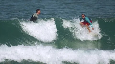 Sea waves surfer training Stock Footage 71023123