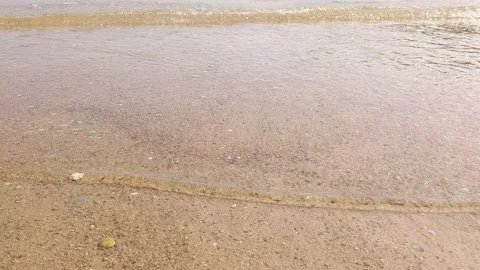 Sea waves surge on the beach Stock Footage 143943527
