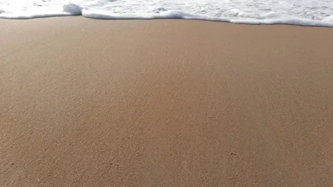 Sea waves swaying the sand Stock Footage 148715022